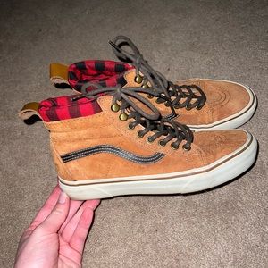 Woman’s high top vans